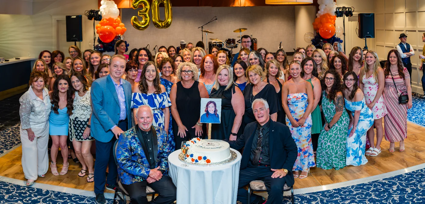 Charles David Salons & Spa team celebrating their 30-year anniversary