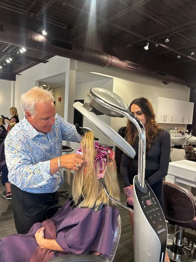Colorist applying foil highlights at Charles David Salon
